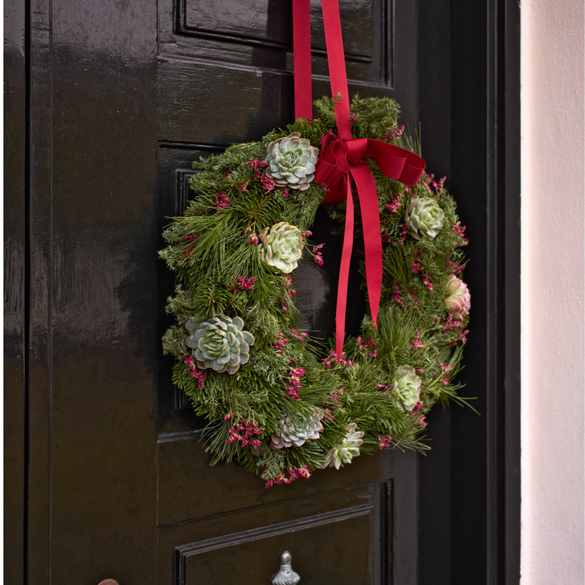 Krans med rødt bånd